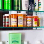 Medicine cabinet with prescription bottles and toiletries