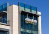 amazon logo on modern glass office building