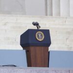 Obama Ocean Lockdown Rolled Back By Trump Podium with a microphone and presidential seal in front of steps