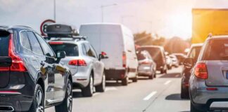 Traffic jam with cars and vans on a multi-lane highway