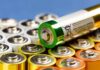 Alkaline batteries stacked with one AA cell on top