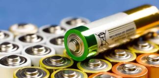 Alkaline batteries stacked with one AA cell on top
