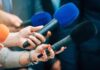 His Uber Ride Turned Into a Police Chase! Reporters holding colorful microphones