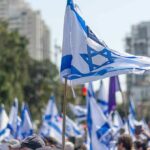 10 Rabbis Confront Mamdani Over Rising Anti-Semitism Israeli flags waved at a street demonstration