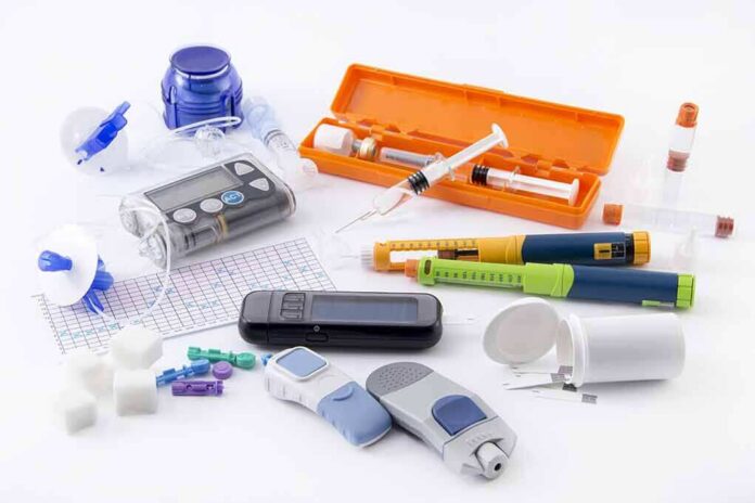 Diabetes management tools and supplies on a white surface