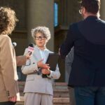 Spokesperson addresses reporters on courthouse steps