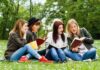 Meta Ran HUNDREDS of Horrific Ads Involving Children Group of young women reading books on grass in a park