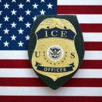 ICE officer badge on American flag background