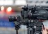 Professional video cameras on tripods