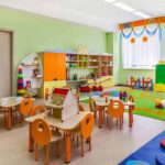 Preschool classroom with colorful furniture and toys