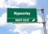‘The View’ Host Tells Floridians Who to Vote For Green highway sign reading hypocrisy next exit