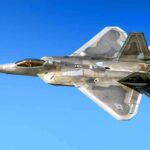Marine F-35 Explodes Near Runway Stealth fighter jet in flight against a clear blue sky