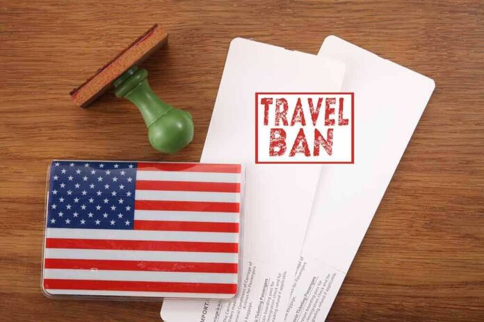 US passport cover with travel documents and a travel ban stamp