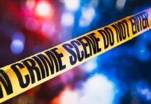 TV Anchor Admits KILLING Her Own Mother yellow crime scene tape with blurred police lights