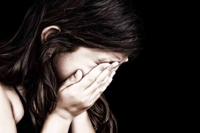 shutterstock_106674485 Child covering face with hands