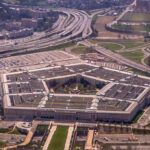 The Pentagon building seen from above with surrounding highways and parking lots