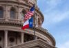 Pro-Life Leader SUED Under Texas Abortion Law Texas and U.S. flags in front of a capitol building dome