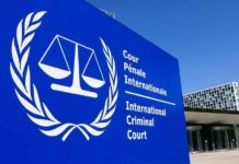 Rubio Hits International Criminal Court With SANCTIONS International Criminal Court sign with scales emblem outside modern building