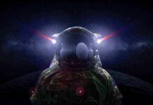 astronaut in space suit facing moon with helmet lights