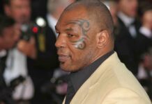 Mike Tyson Makes Bold MIDTERM Prediction at WH Mike Tyson in profile at an event